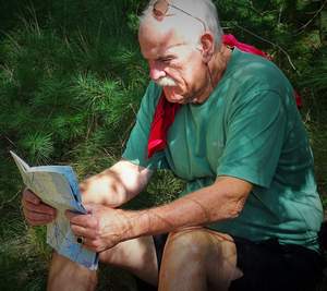 Hike leader reads a map